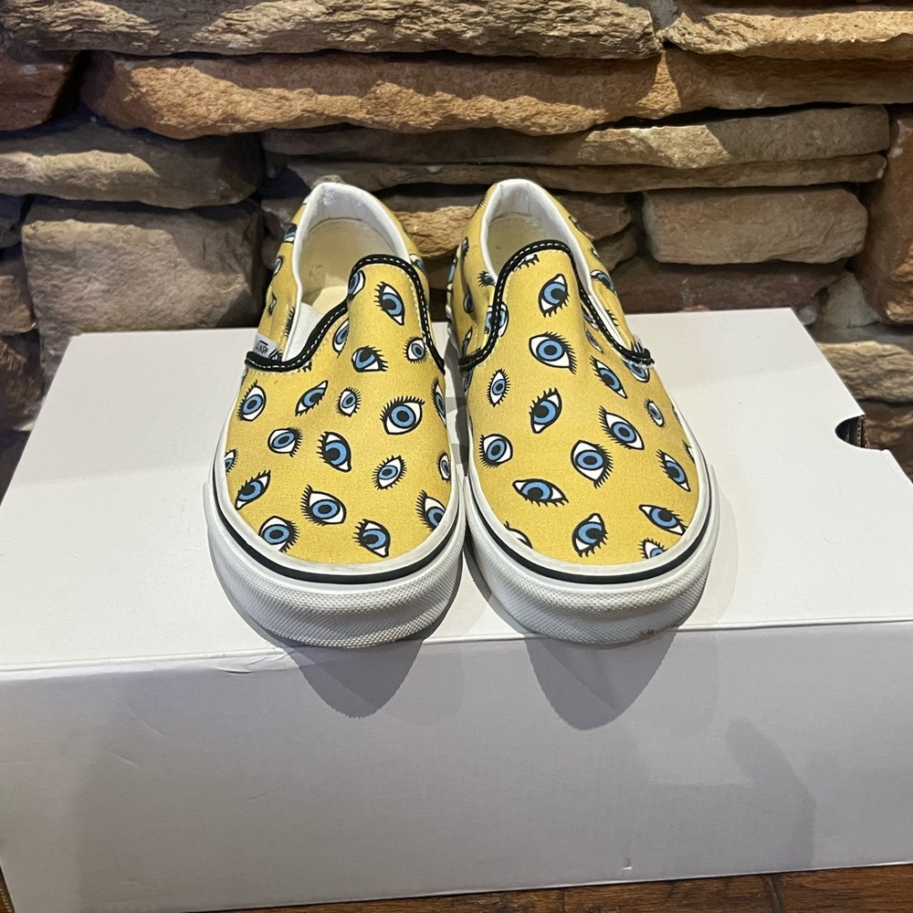 Vans Yellow Slip-On Sneakers with Eye Pattern